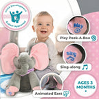 Interactive grey and pink elephant singing plush toy with moving ears