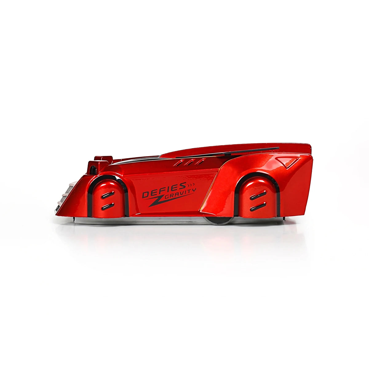 Red laser controlled car toy that defies gravity on walls