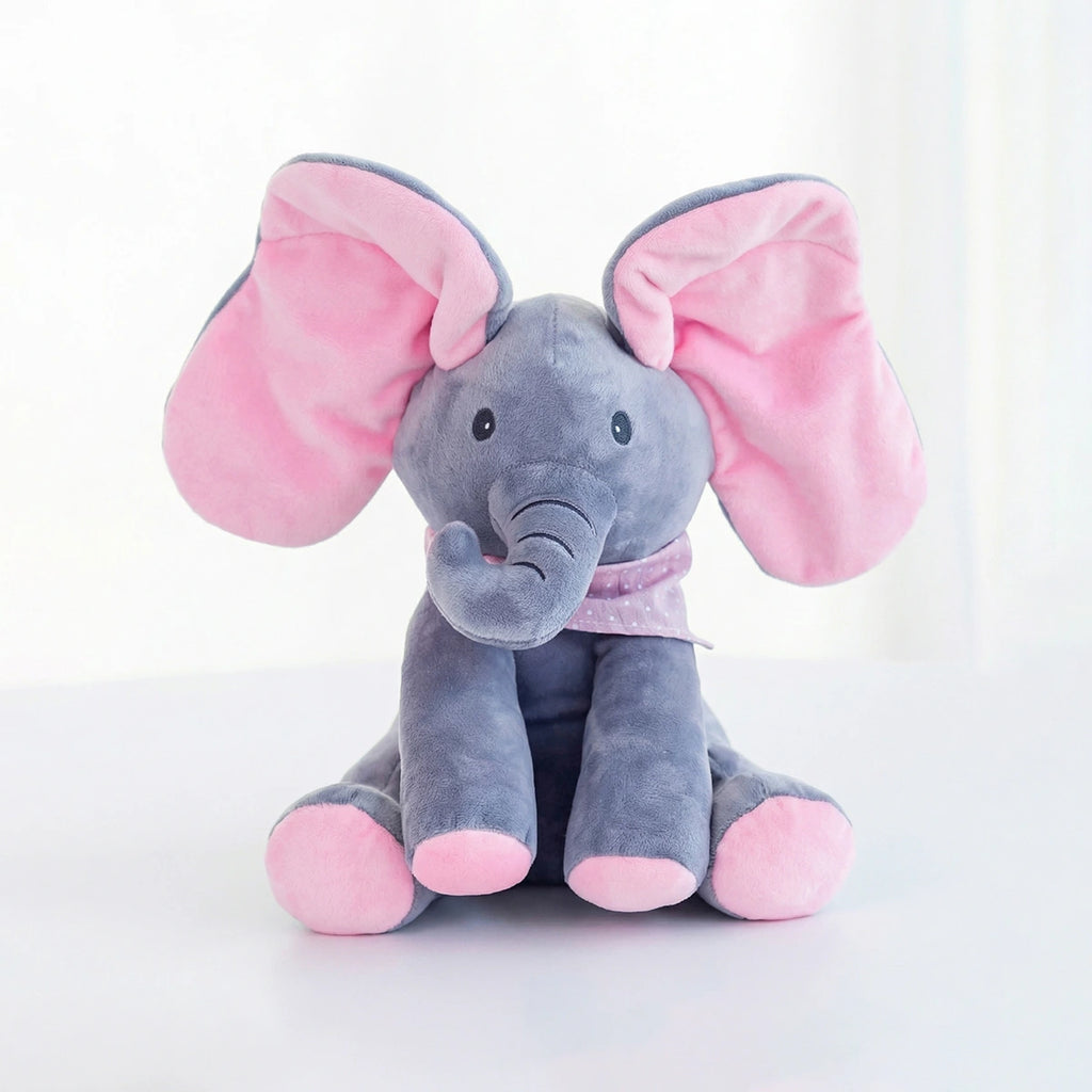 Interactive grey and pink elephant singing plush toy with moving ears