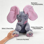 Interactive grey and pink elephant singing plush toy with moving ears